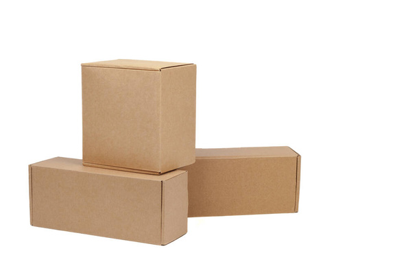 Cardboard boxes for goods on a white background. Different size. Isolated on white background - Fotó, kép
