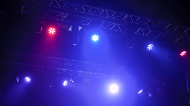 Colorful bright concert lighting equipment for stage at nightclub - Footage, Video