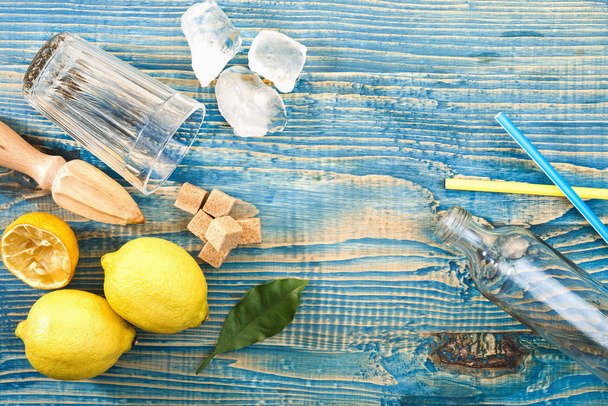 Lemonade preparation, Ingredients for lemonade on a wooden table - Φωτογραφία, εικόνα
