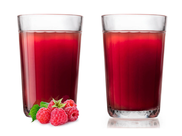 Faceted glasses with raspberry smoothie. One glass alone, one with berries on foreground. Separate clipping paths for each glass, for berries and for shadows - Photo, image