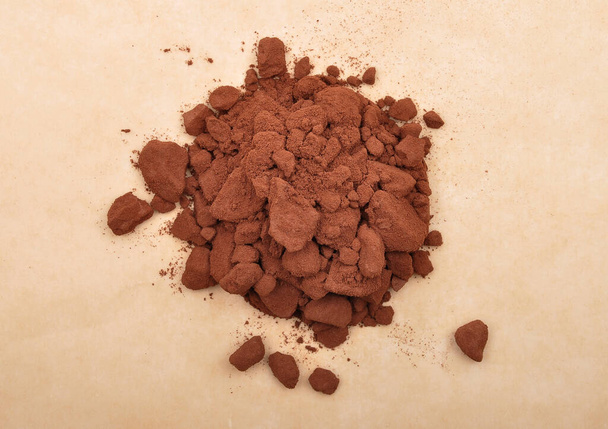 Cacao powder on brown background - Fotografie, Obrázek