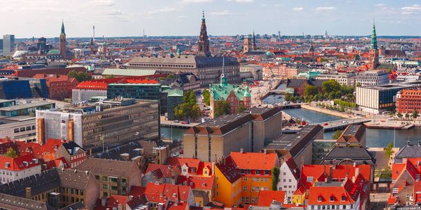 Scenic summer aerial view of Old Town skyline with Boersen and Christiansborg and lot of red roofs, Copenhagen, capital of Denmark - Фото, зображення