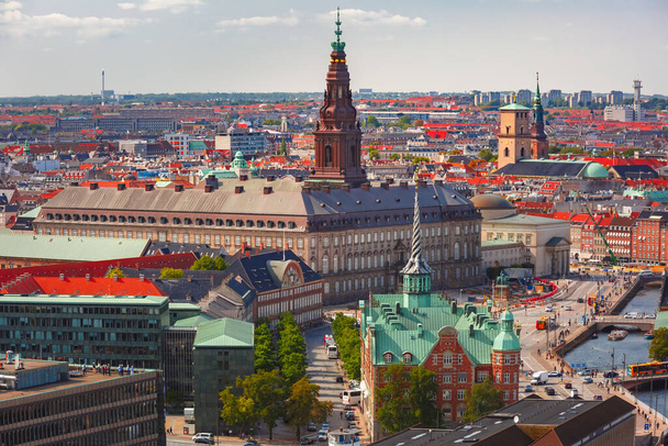 Scenic summer aerial view of Old Town skyline with Boersen and Christiansborg and lot of red roofs, Copenhagen, capital of Denmark - Foto, Imagen