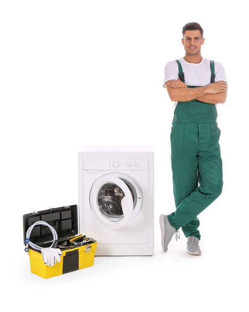 Repairman with toolbox near washing machine on white background - Foto, Imagem
