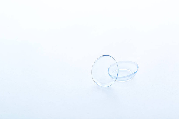 Contact lenses on white background - Foto, afbeelding