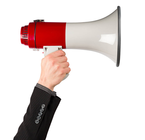 businessman hand in suite with red white bullhorn megaphone isolated background - Valokuva, kuva