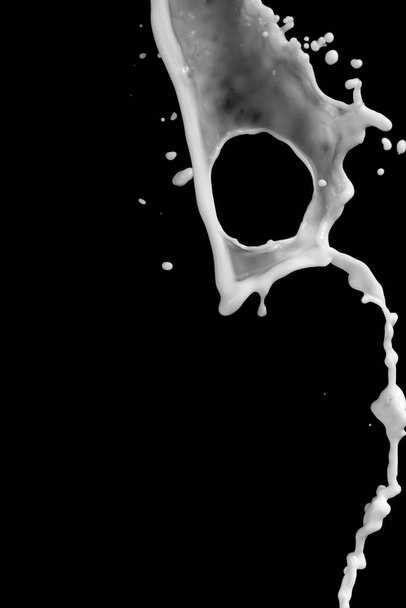 splash of milk on a black background - Foto, immagini