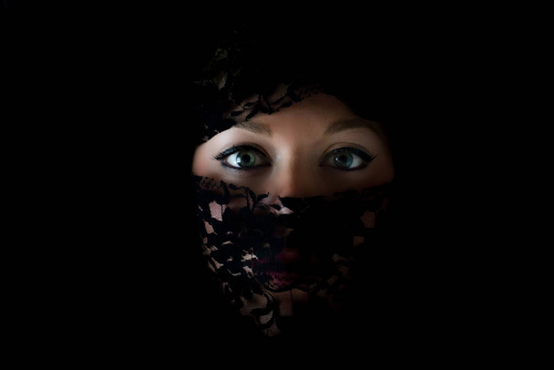 Veiled woman with blue eyes - Fotó, kép