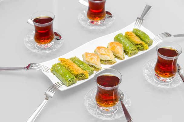 Turkish desserts and tea - Fotó, kép