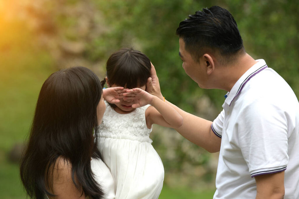 asian girl crying with family comforting - 写真・画像