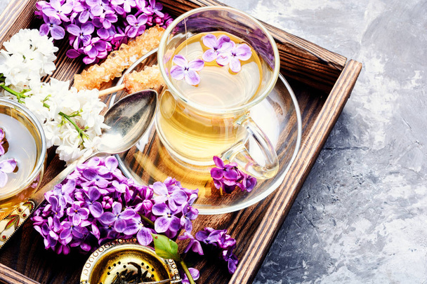 Tea and bouquet of beautiful spring flowers.Relaxation concept - Fotografie, Obrázek