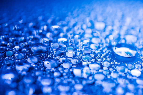 Blue water drops background with bokeh. - Foto, Imagen