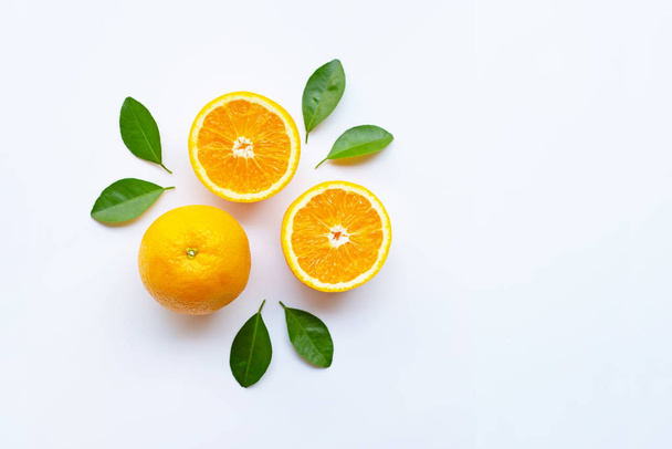 Fresh orange citrus fruits with leaves on white background.  Top view - Foto, immagini