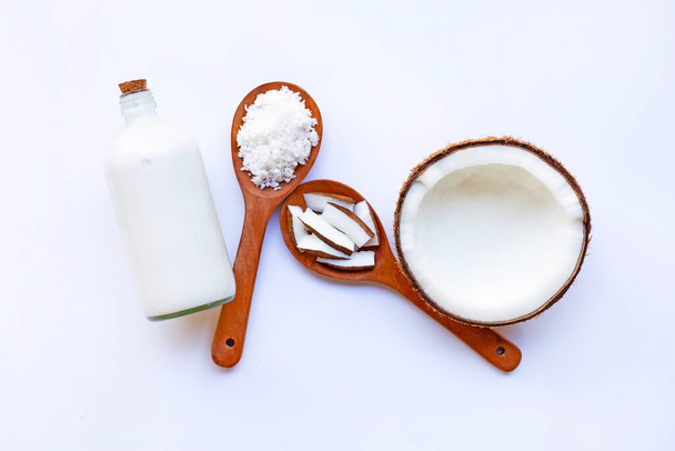 Coconut with coconut milk on white background. - Fotoğraf, Görsel