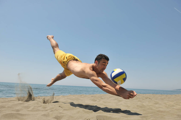 male beach volleyball game player jump on hot sand - Φωτογραφία, εικόνα
