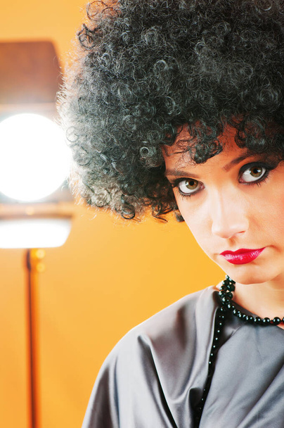 Young attractive girl with afro curly haircut - Foto, Imagen
