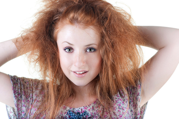 Portrait of red-haired smiling girl. - Foto, imagen