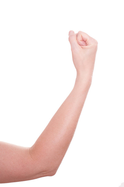 white cropped female fist with arm - Foto, immagini