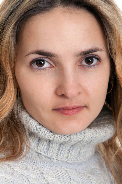portrait of blonde in a sweater closeup - Foto, imagen