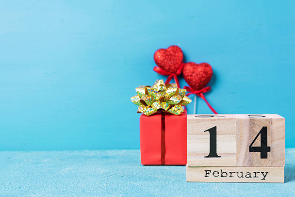 Valentine day. Wooden calendar with February 14 on it. - Fotografie, Obrázek