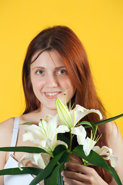 Girl with white lily - Фото, зображення