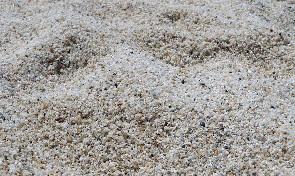 Природные белые мраморные камни текстура с избирательным фокусом в middle.Quartz галечный пляж. Кварцевые гальки текстуры мелких камней с выборочной фокусировкой. Белая галька. Маленькие камни
. - Фото, изображение