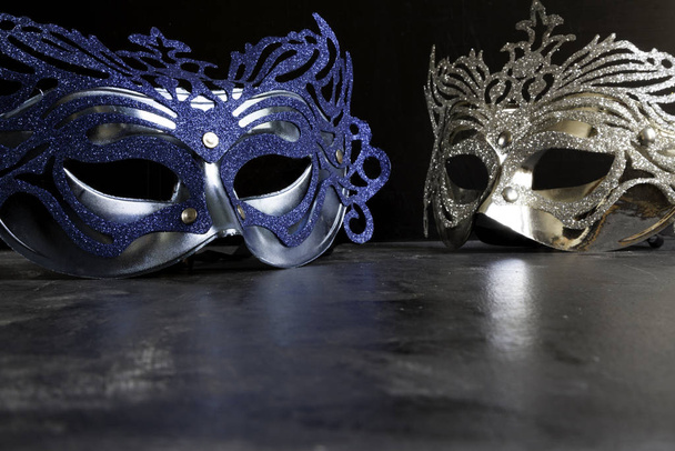 blue and silvery carnival masks on dark - Photo, Image