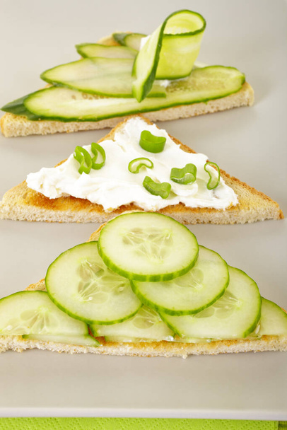 fresh sandwiches with cucumber, cream cheese, chives for afternoon tea - Photo, Image