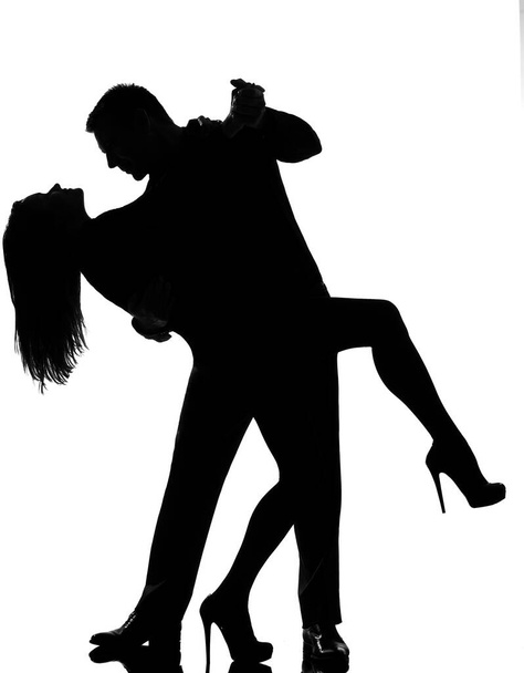 one caucasian couple lovers  man and woman dancing tango in studio silhouette isolated on white background - Φωτογραφία, εικόνα