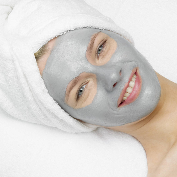woman with facial mask - Фото, изображение