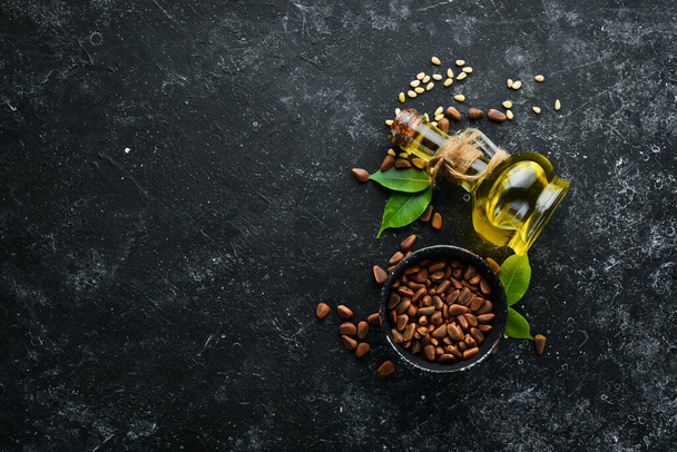 Pine nuts oil and pine nuts. Superfood. free space for your text. Top view. - Foto, immagini