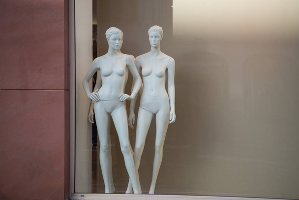 nude mannequins in a fashion store showroom - Foto, Bild