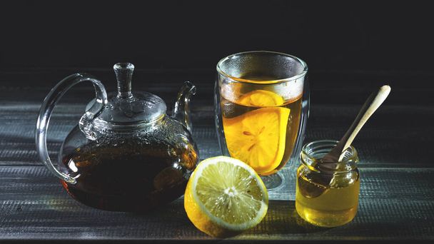 lemon, black tea, honey. Tea party. Teapot.  - Fotografie, Obrázek