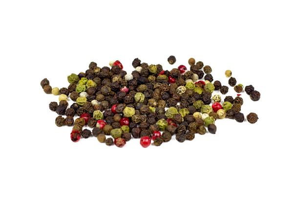 Black, red and white peppercorns, pepper mix isolated on white background. - Photo, Image