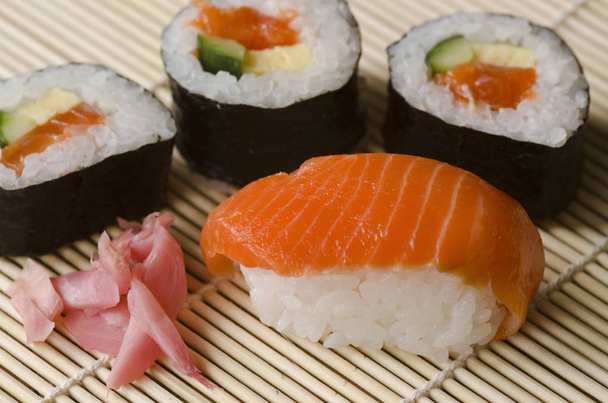 Japanese cuisine, sushi, Asian food with fish  - Photo, image