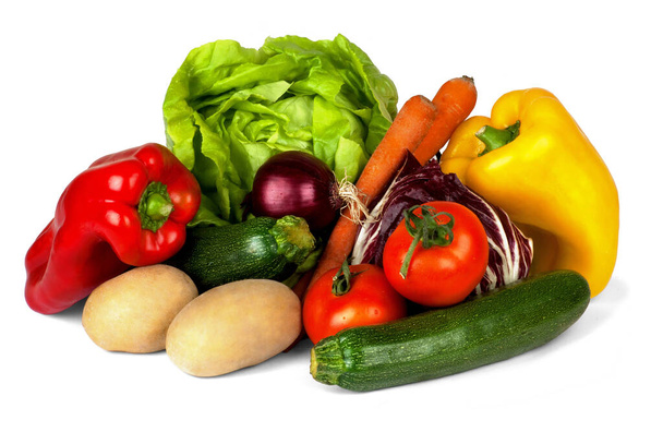 COMPOSITION OF SEASONAL FRESH SLICED VEGETABLES: TOMATOES, ONIONS, SALAD AND PEPPERS - Foto, immagini