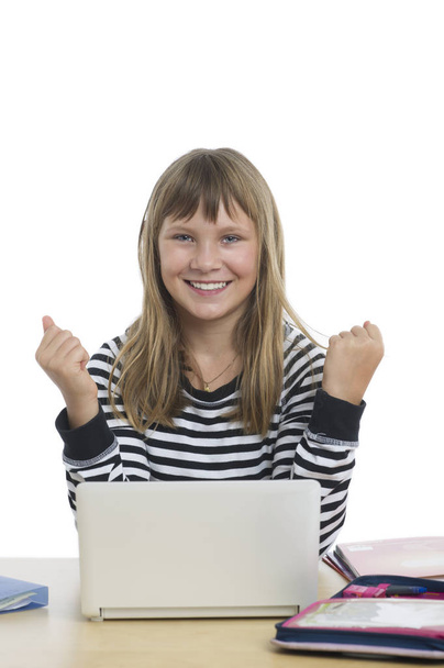 young student girl sitting at table with laptop - Foto, Bild