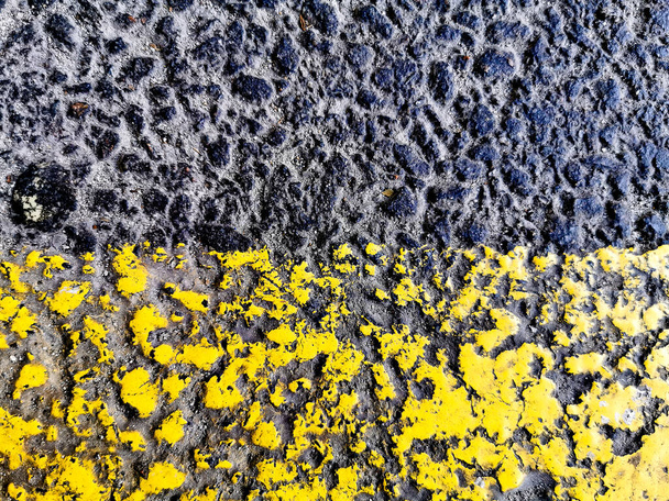 Texture di asfalto nero e giallo per la progettazione, sfondo o carta da parati
. - Foto, immagini