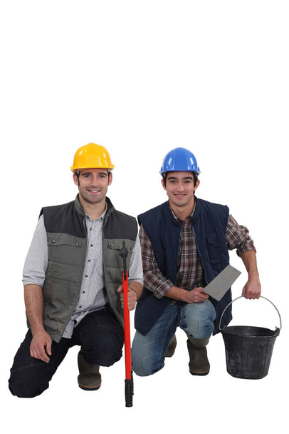 Two smiling construction workers - Fotó, kép