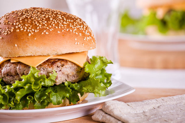 Close up photograph of a tasty burger for lunch - 写真・画像