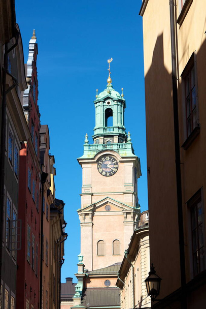 The Great Church tower in Gamla Stan versus the sky - Photo, Image