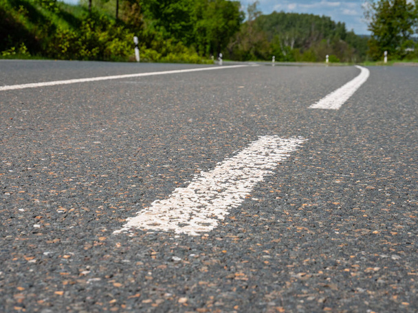 Road limit on the asphalt of a road - 写真・画像