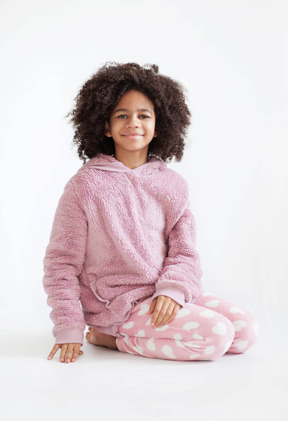Cute girl in soft pink pajama - Фото, зображення