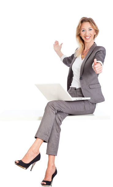 woman is sitting with laptop - Φωτογραφία, εικόνα