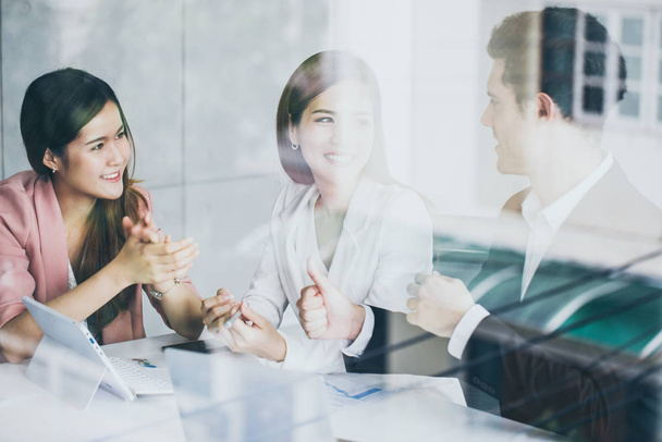 Diverse women sitting in circle enjoying sharing stories in group meeting.Young woman arriving for a job interview. Business people talking in modern office. colloquy dream job. - Photo, Image
