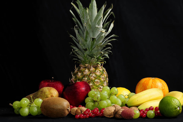 fruits on a black background - Foto, imagen