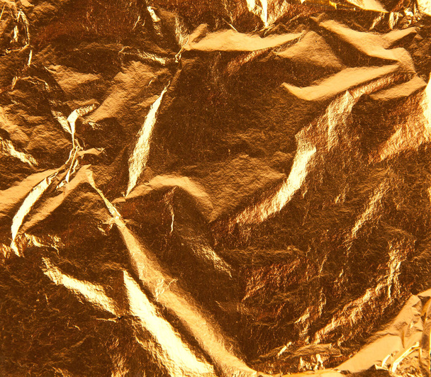 Εικόνα του στριμμένου φύλλου χρυσού 24k - Φωτογραφία, εικόνα