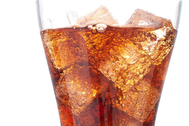 glass of cold cola with ice cubes, close-up  - Photo, Image