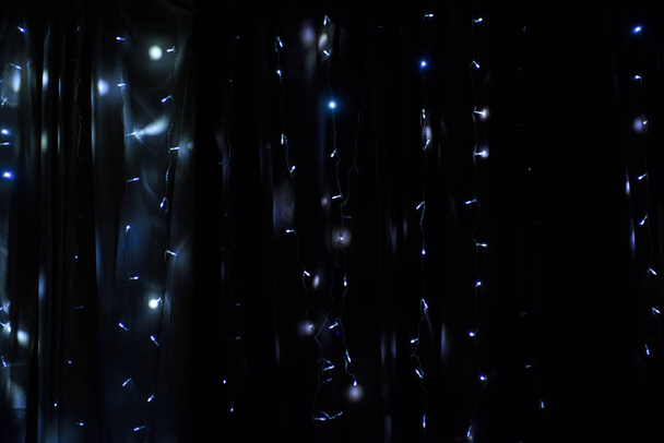 Festively decorated with a luminous garland curtain. - Valokuva, kuva