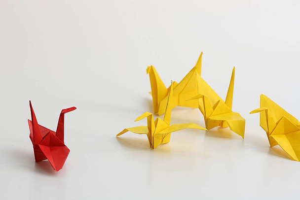 Origami is the art of paper folding, which is often associated with Japanese culture - Фото, зображення